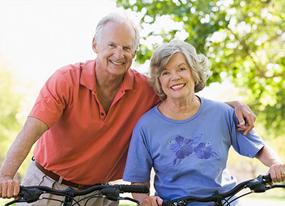 Photo of a man and woman on bicycles 60-70.jpg